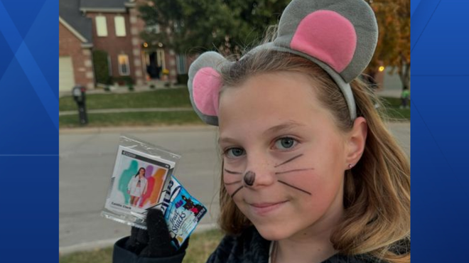 Avery&#x20;Ireland,&#x20;11,&#x20;of&#x20;West&#x20;Des&#x20;Moines,&#x20;shows&#x20;off&#x20;part&#x20;of&#x20;her&#x20;haul&#x20;from&#x20;trick-or-treating&#x20;Halloween&#x20;night.&#x20;The&#x20;Caitlin&#x20;Clark&#x20;cards&#x20;were&#x20;from&#x20;Clark&#x27;s&#x20;parents.