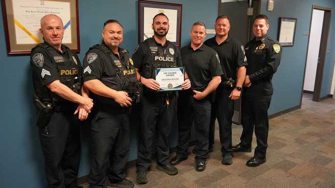 officer chris anzalone receives award