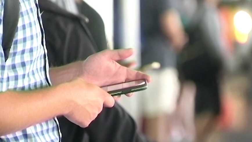 Person holding a compartment  phone