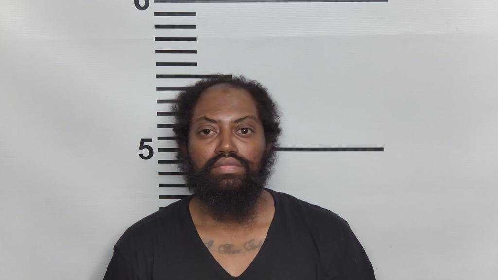 Man arrested, charged in connection to Russell neighborhood homicide