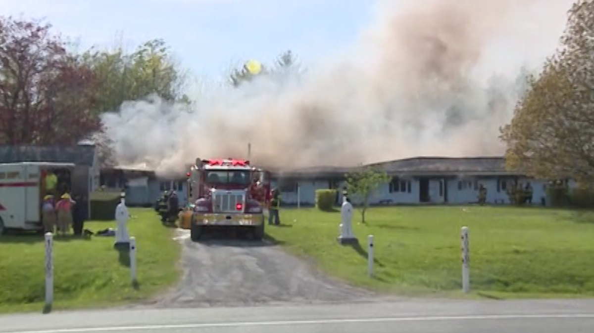 Apartment building heavily damaged in Champlain fire