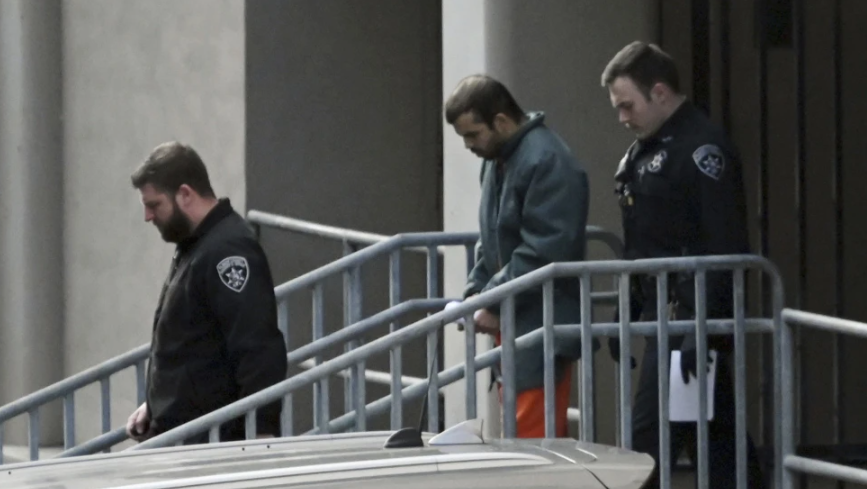 New charge filed against man accused of firing shotgun outside New York ...