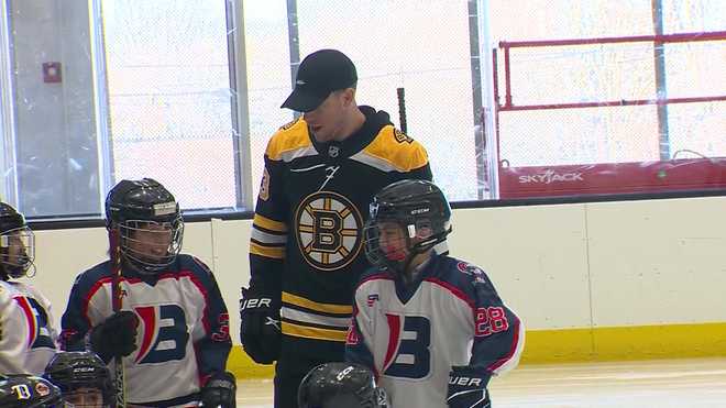 Bruins invite longtime Mass. youth hockey coach battling cancer to
