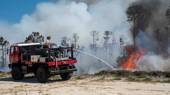 zero-turn lawnmower brush fire 3-11-25