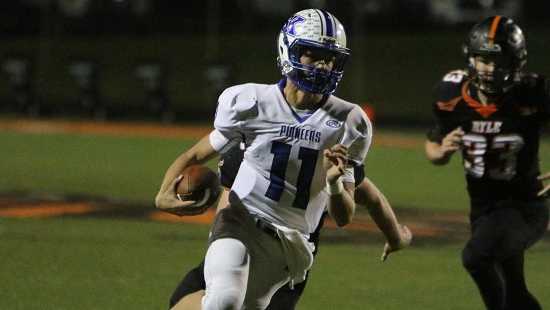 Simon Kenton QB Chase Crone takes off picking up yardage in the Pioneers win over Ryle
