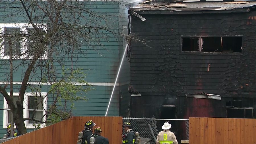 Chelsea firefighters at the scene of a house fire where a man's body was found on May 3, 2019.