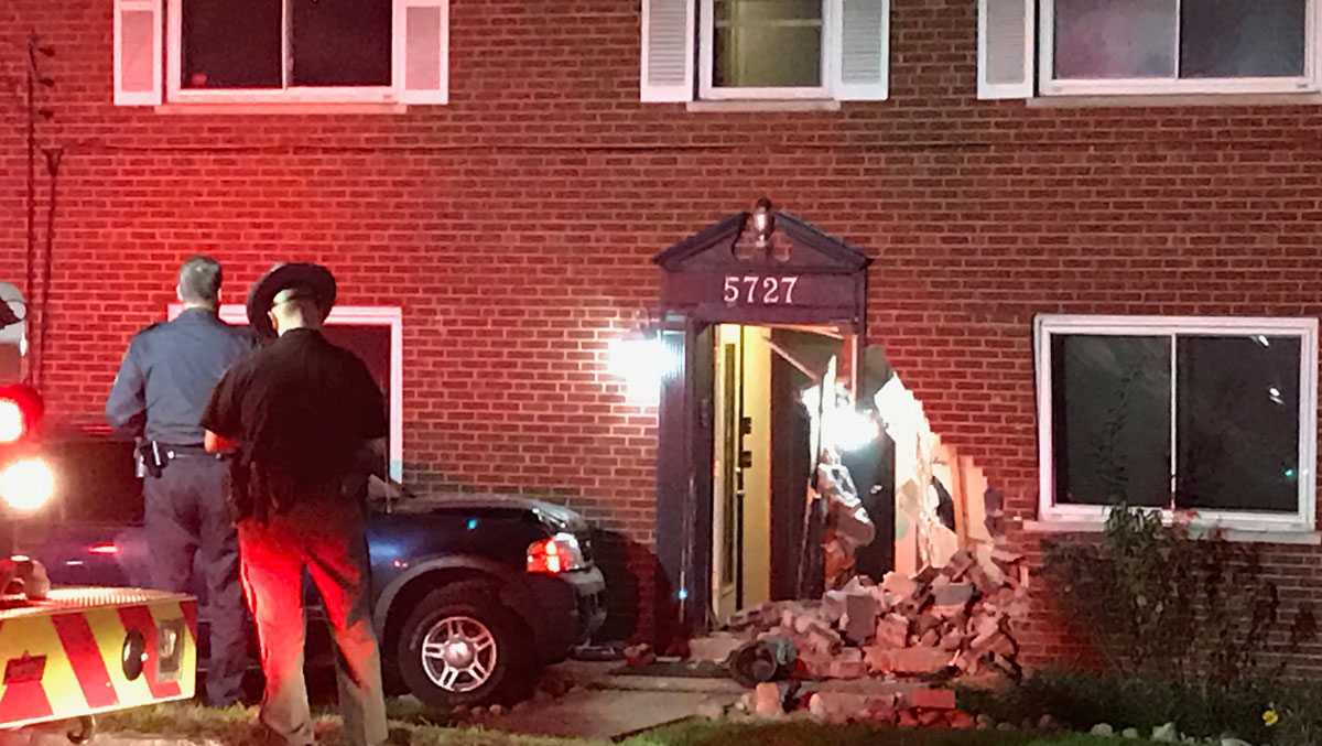 SUV slams into apartment building in Green Township