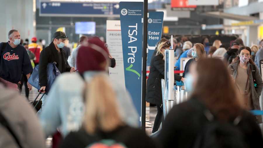 FILE: CHICAGO, ILLINOIS: Passengers enter a Transportation Security Administration (TSA) checkpoint at O'Hare International Airport on October 19, 2020 in Chicago, Illinois.