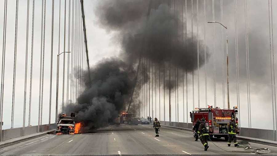 Firefighters respond to a vehicle fire on the bay bridge brought morning traffic to a halt and sent plumes of dark smoke into the air thursday morning, aug. 19, 2021.