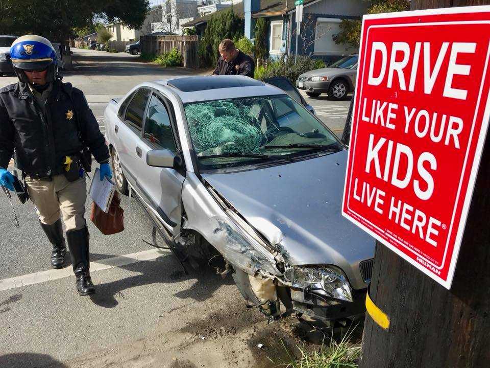 Santa Cruz driver crashes into drive like your kids live here sign