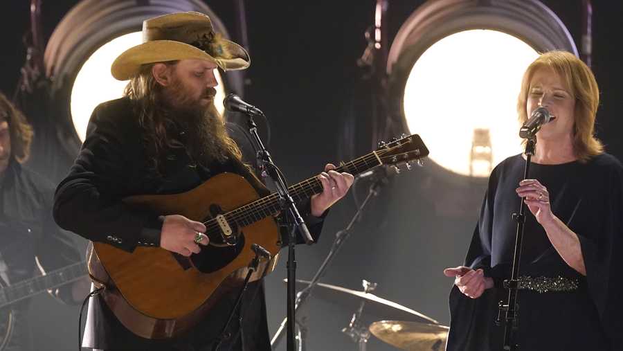 Chris Stapleton, left, and Patty Loveless perform "You&apos;ll Never Leave Harlan Alive" during the 56th Annual CMA Awards on Wednesday, Nov. 9, 2022, at the Bridgestone Arena in Nashville, Tenn. (AP Photo/Mark Humphrey)