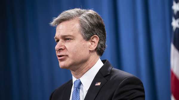 In this Oct. 28, 2020, file photo, FBI Director Christopher Wray speaks during a virtual news conference at the Department of Justice in Washington.