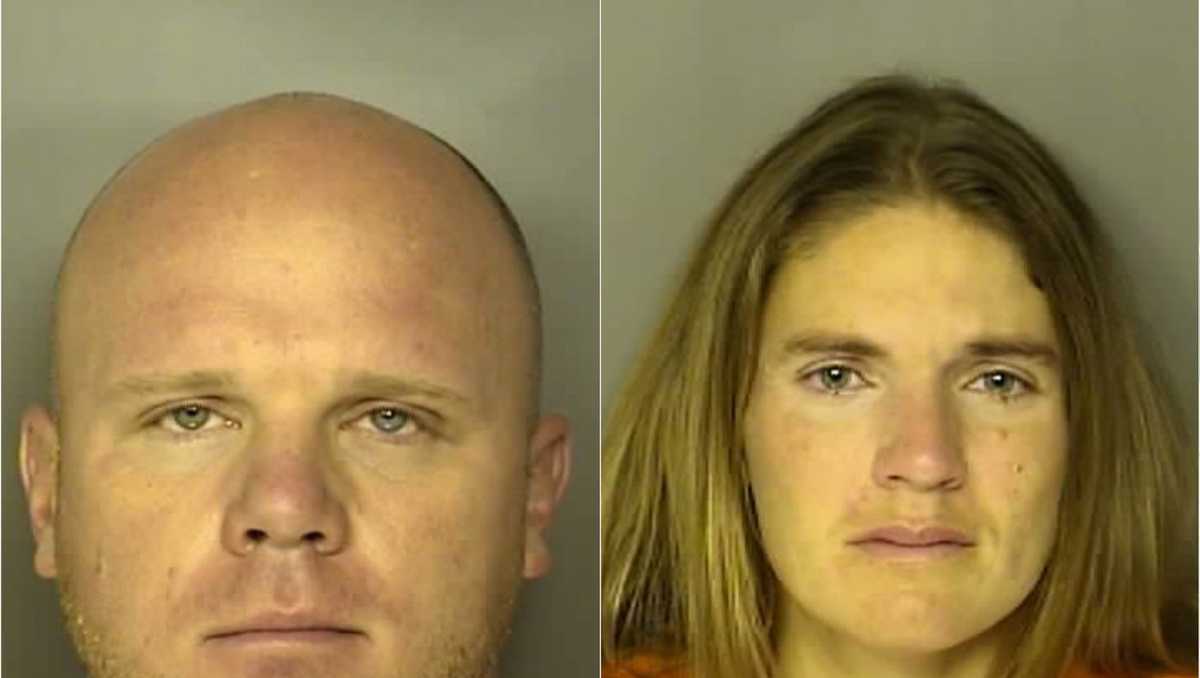 South Carolina coroner, woman charged with murder of missing man