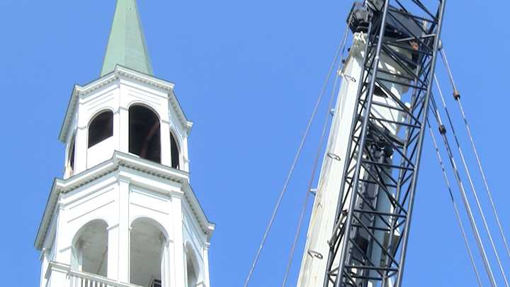 Construction begins on church steeple