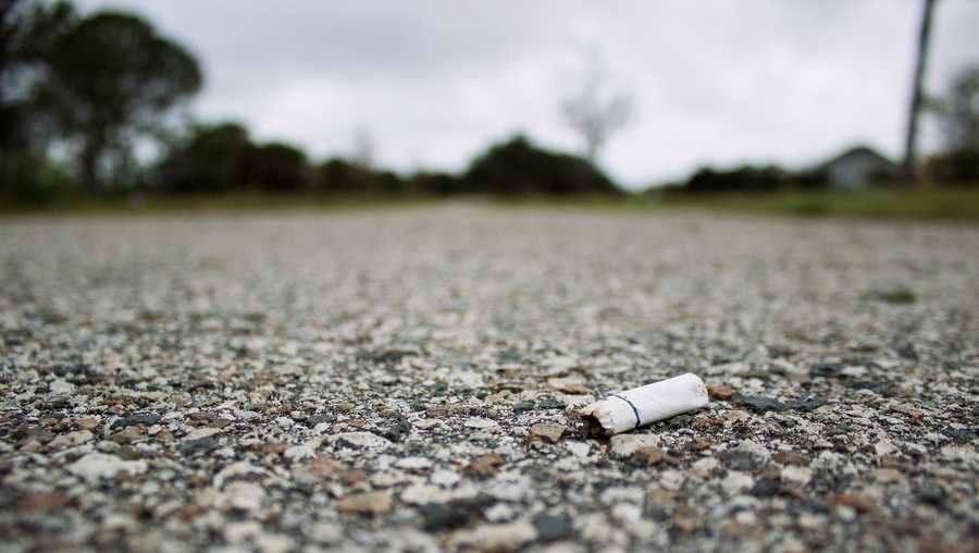 Cigarette on road, litter, roads