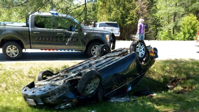 Woman injured after car hits embankment in Maine, flips onto roof