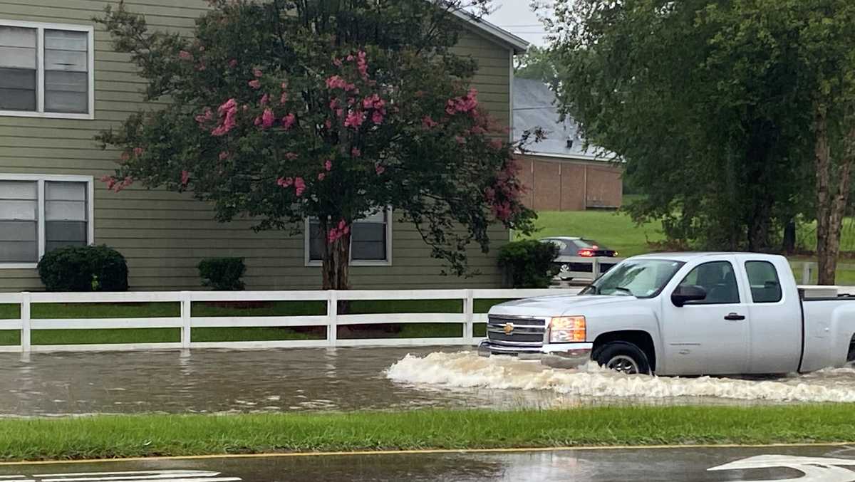 Flash flooding creates streams through Clinton neighborhoods