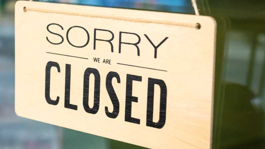 generic sign reading" sorry we are closed"
