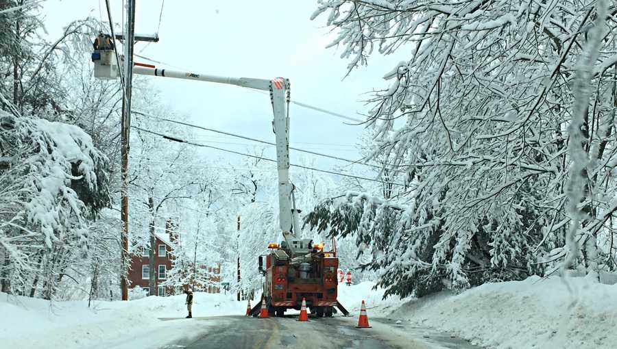 File photo of a Central Maine Power restoration crew
