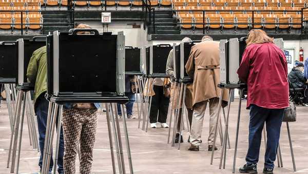 Voters fill out ballots during early voting for the Kentucky general election on November 2, in Owensboro, Kentucky.