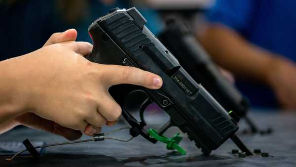 Kids who watched a short gun safety video were less likely to touch a gun they found and pull the trigger, a new study finds. (Brandon Bell/Getty Images)