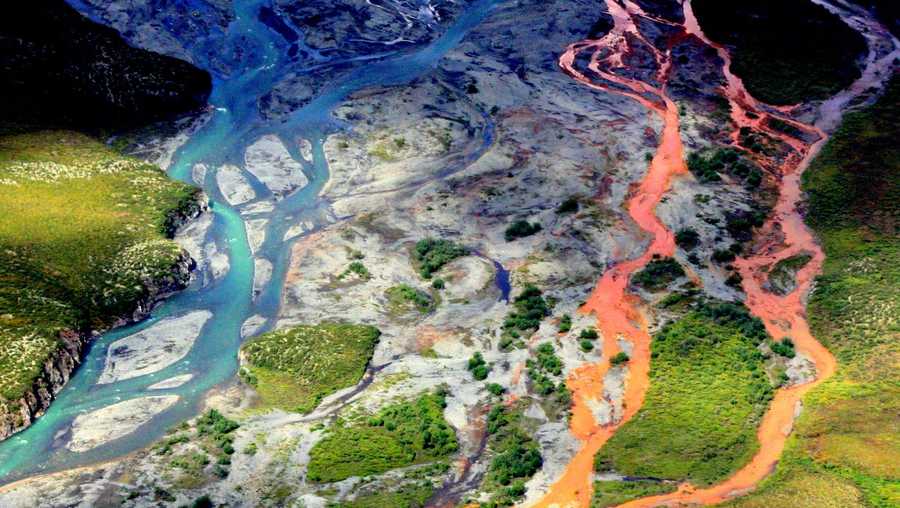 An aerial view of the rust-colored Kutuk River in Gates of the Arctic National Park in Alaska.