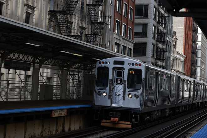 An&#x20;elevated&#x20;train&#x20;moves&#x20;along&#x20;the&#x20;tracks&#x20;on&#x20;August&#x20;16,&#x20;2024,&#x20;in&#x20;Chicago.