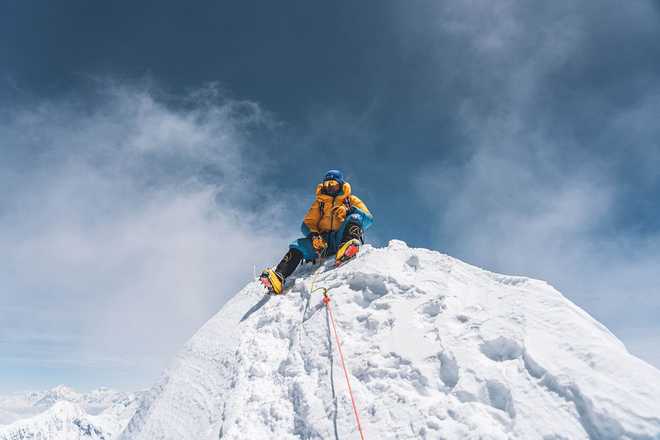 Nepali mountaineer Nima Rinji Sherpa is pictured at Mount Annapurna in this handout photograph taken on April 12, and released by 14 Peaks Expedition.