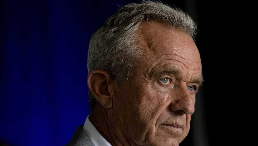 Robert F. Kennedy Jr. takes questions from reporters during a campaign event in Aurora, Colorado, on May 19, 2024.