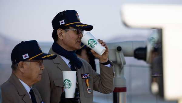 South Korean veterans drink coffee at an observation deck of the Starbucks Coffee in Gimpo.