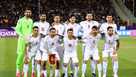 Iran's national team poses for a photo before its World Cup qualifier against Uzbekistan in March 2025.