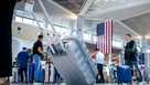 Travelers at Newark Liberty International Airport in Newark, New Jersey, on Monday.