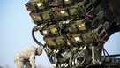 A US soldier inspects a Patriot missile defense battery during join exercises at the military grounds in Sochaczew, Poland, on March 21, 2015.