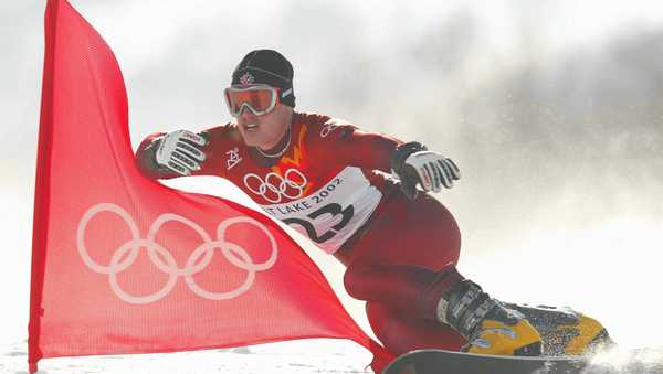 This February 2002 photo shows Ryan Wedding of Canada competing in the men's parallel giant slalom snowboarding event during the Salt Lake City Winter Olympic Games.