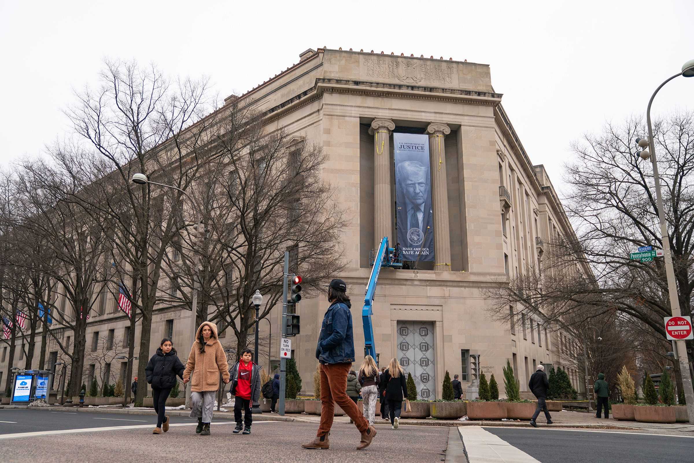 Giant banner of Donald Trump hung at Justice Department headquarters