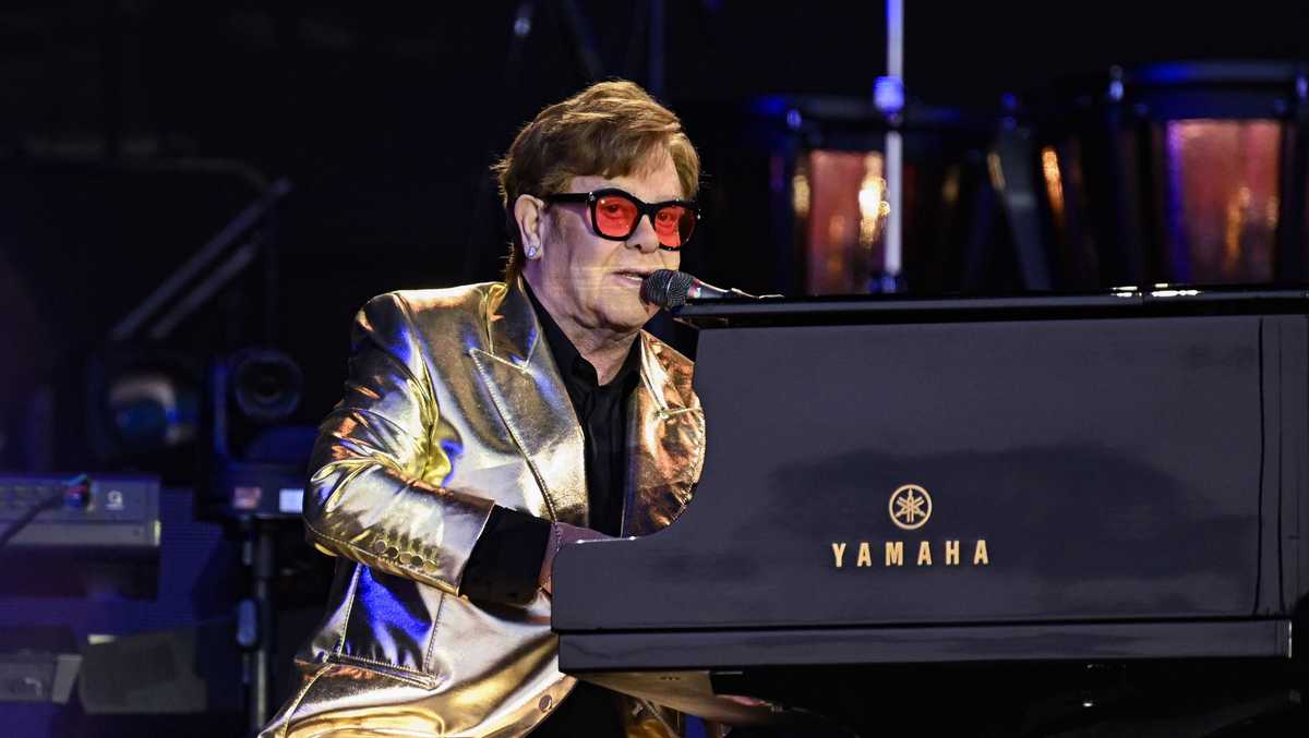 Elton John briefly hospitalized after a fall, now back home and in