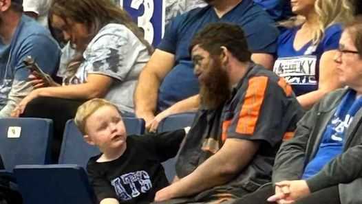 UK Cal coach is offering VIP basketball tickets to Miner and family seen in photo