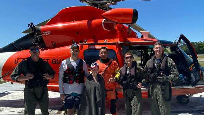 Coast Guard rescues father, son whose canoe capsized