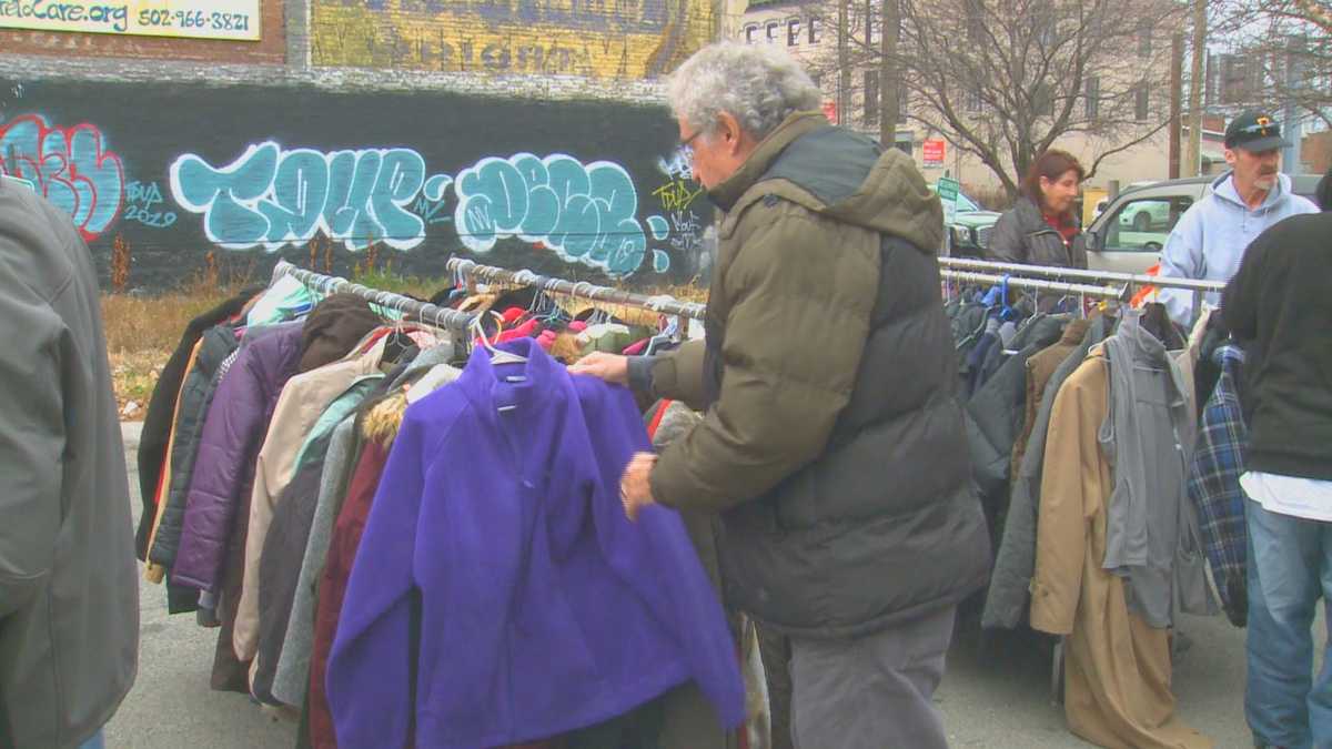 Volunteers donate winter gear to those in need during Louisville coat