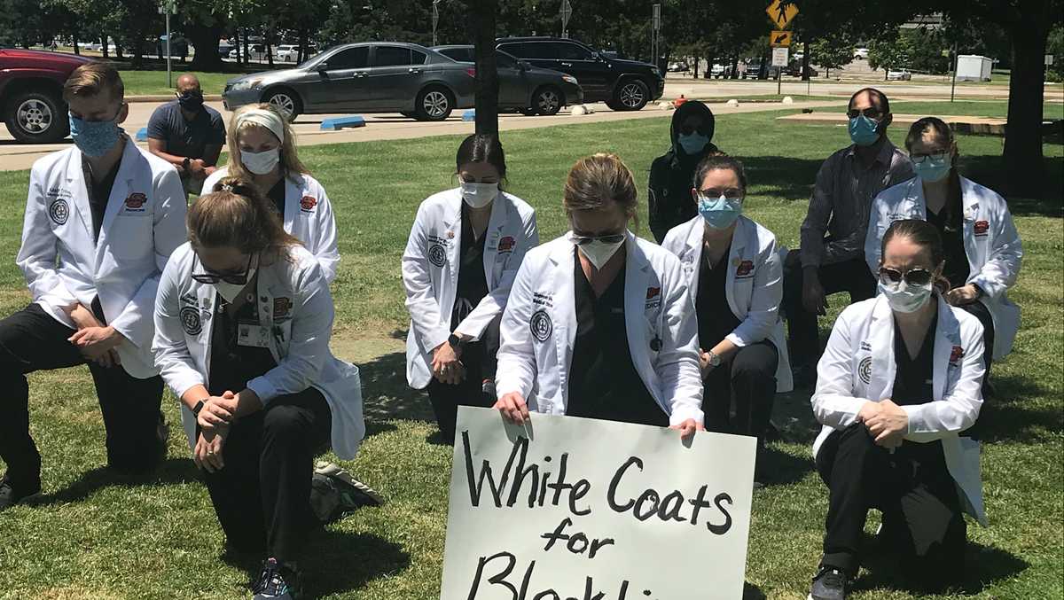 White Coats for Black Lives Oklahoma medical workers take knee in