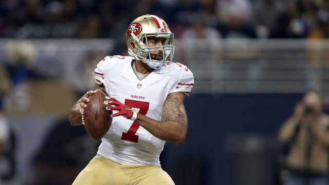 NFL players buy an Xbox for boy wearing Kaepernick jersey