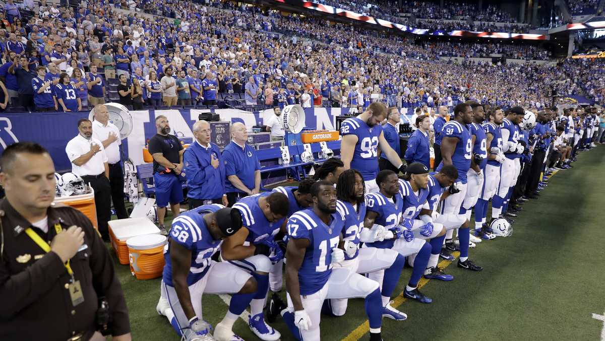 PHOTOS NFL players kneel to protest Trump's remarks