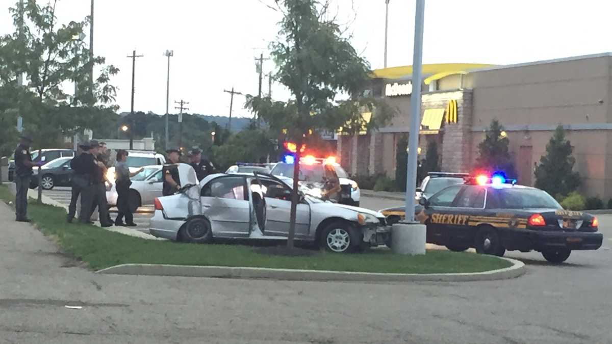 Photos Police chase ends with crash, 2 in custody