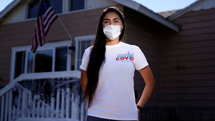 Veronica Pelayo, a contact tracer for the COVID-19 virus, stands for a portrait Thursday, Oct. 22, 2020, in San Diego.