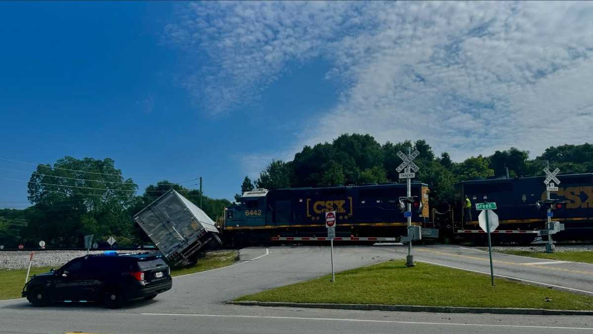 Georgia: Train collides with semi truck, causing road closures
