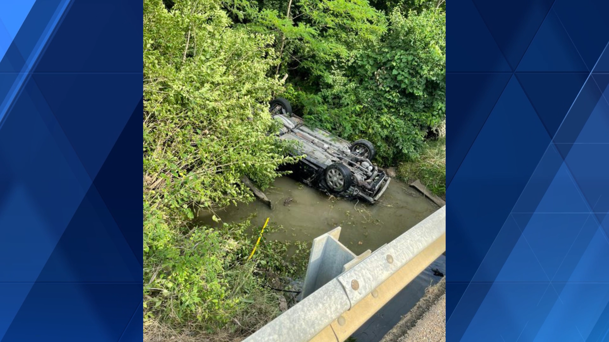Police close Zoar Road in Maineville after car goes off road into creek