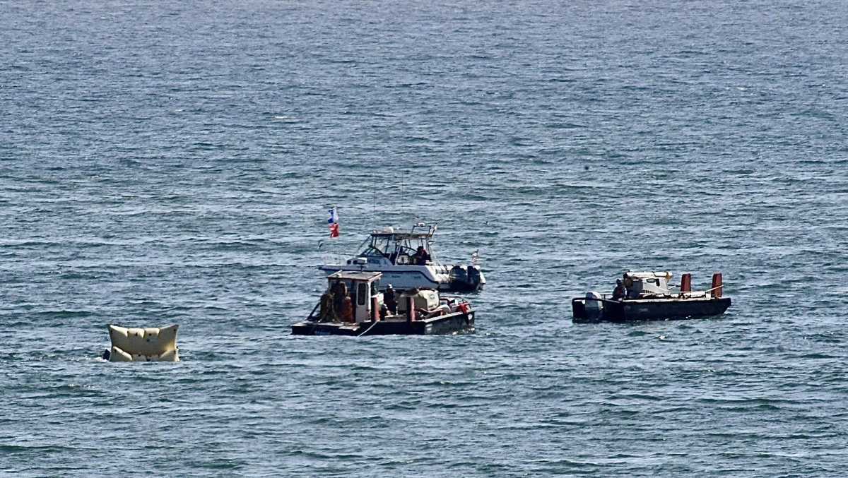 Crews retrieve sunken skid steer from Santa Cruz Wharf