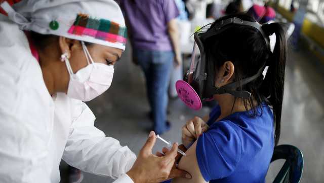 US faces increased calls to share abundant COVID-19 vaccine doses with poorer countries - Vimarsana News