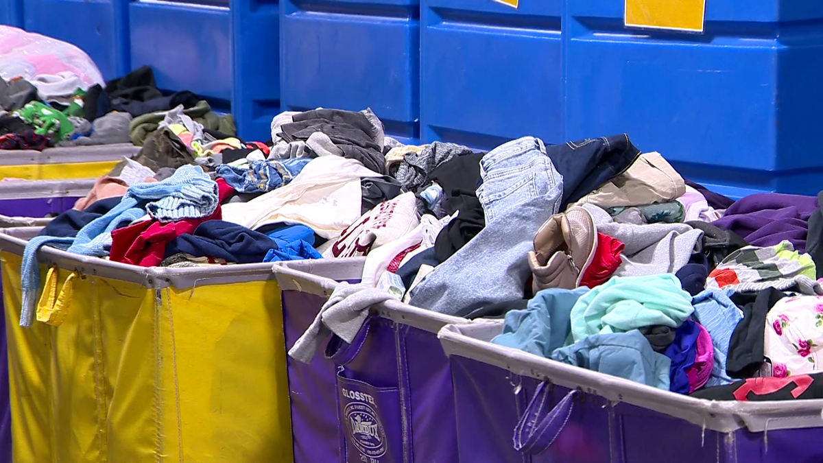 Truckload of donated clothes from Jordan's Furniture arrives at Cradles