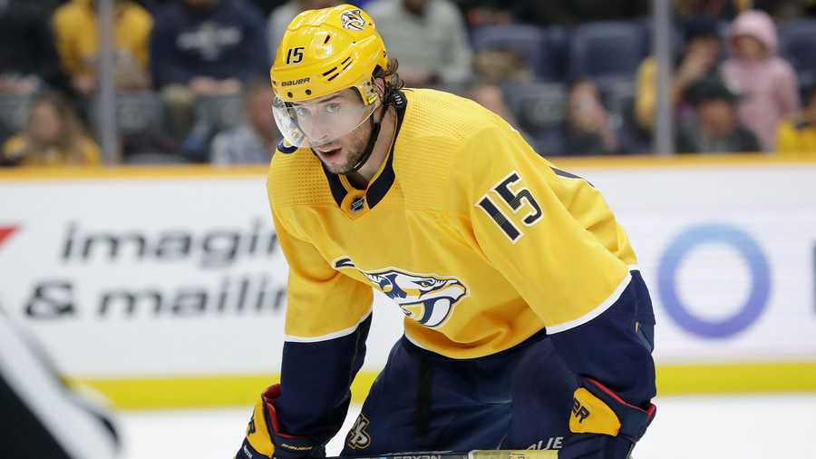 Nashville Predators right wing Craig Smith plays against the New York Islanders in the second period of an NHL hockey game Thursday, Feb. 13, 2020, in Nashville, Tenn. (AP Photo/Mark Humphrey)